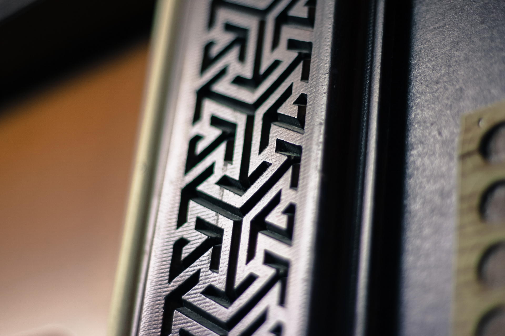 Geometric CNC cut metal door architrave with modern Islamic pattern